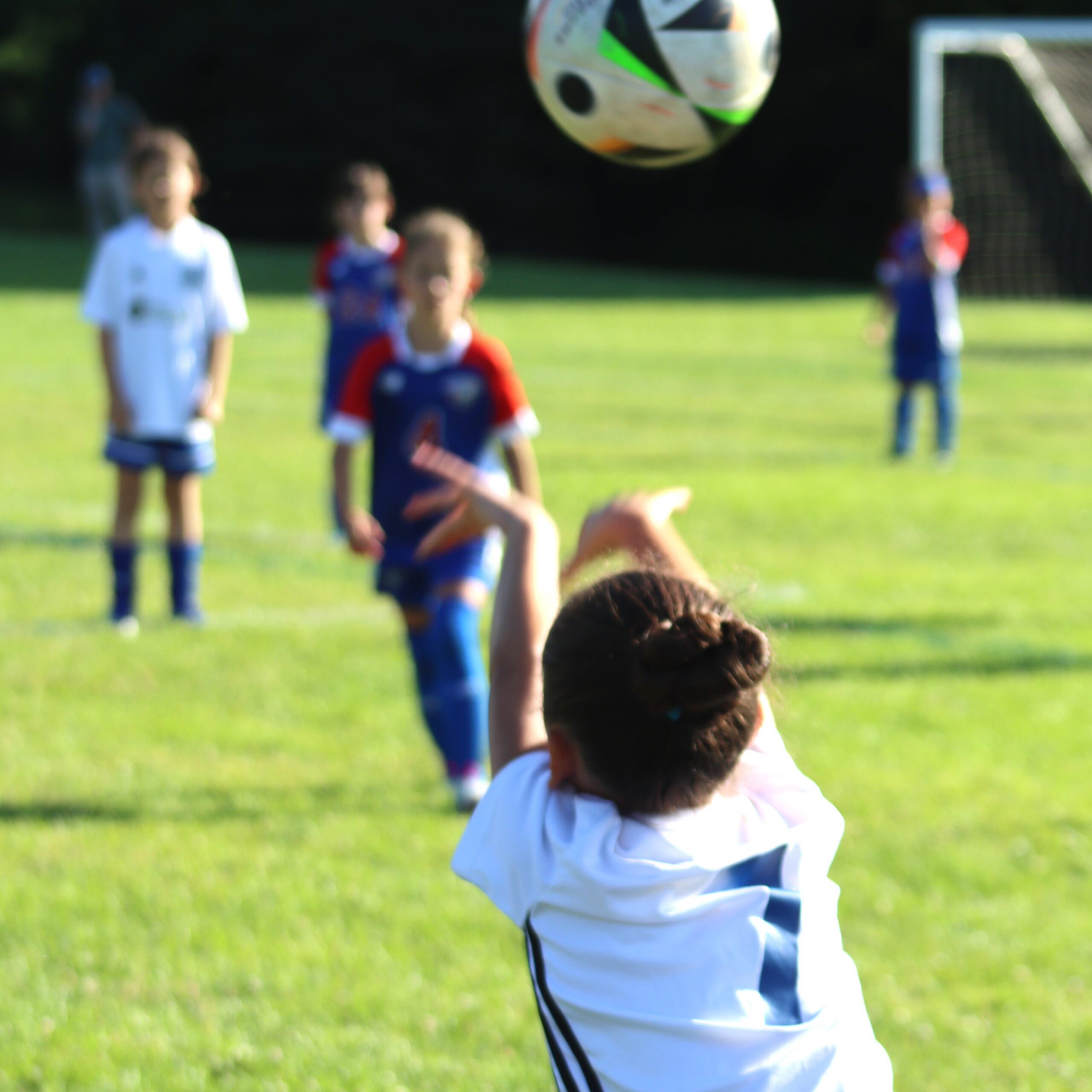 Throw In Brockport Soccer Club girls player throws in a ball to a teammate